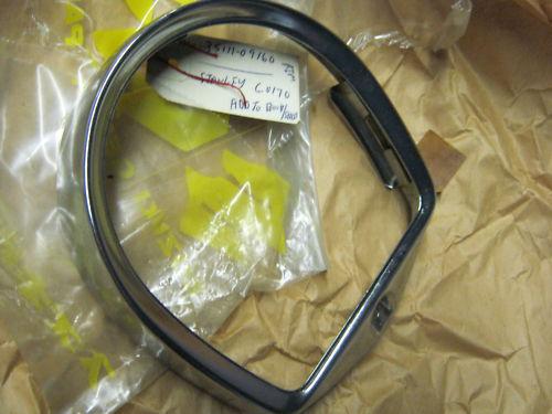 Suzuki t10 s32-2  nos headlamp rim 1963-1968