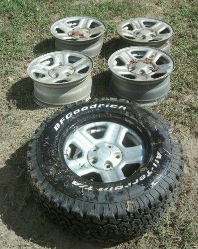 5 stock jeep rims 