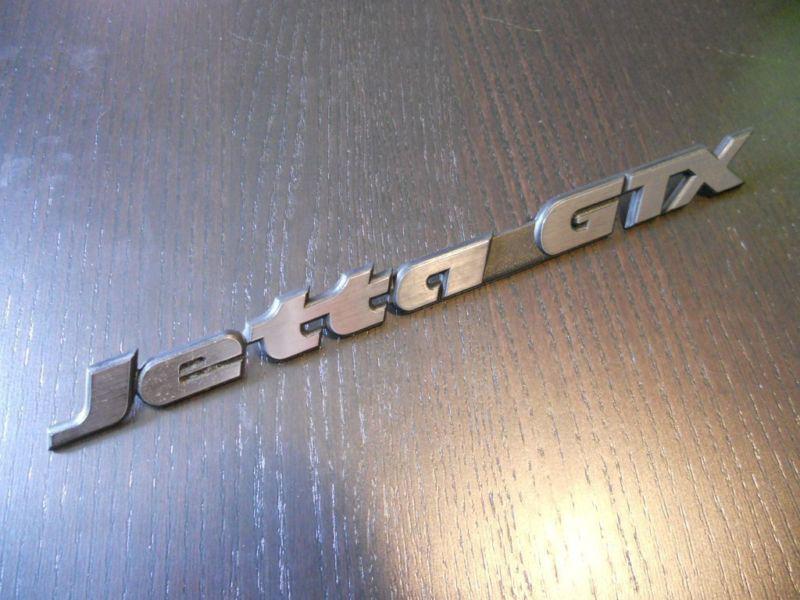 Volkswagen "jettagtx" emblem nos oem vw pn 165-853-687-n