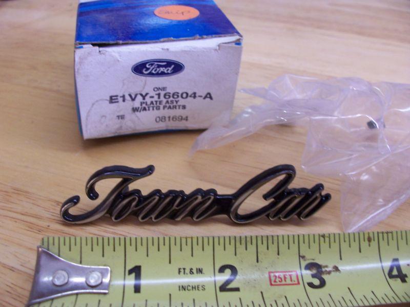 Nos, town car emblem, plate w/clips, #e1vy-16604-a