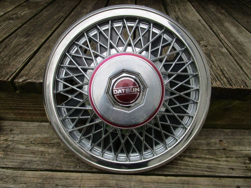 Nos datsun 810 &amp; maxima wire spoke hubcap