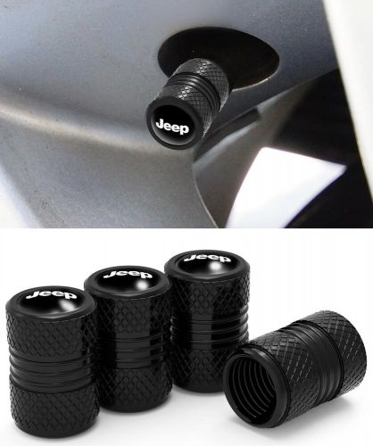 Jeep grill in black on black aluminum tire valve stem caps