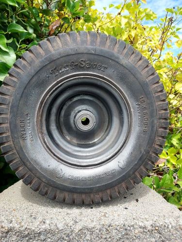 6 inch  wheel with bearings and carlisle tire  mini bike   used