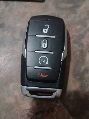 Genuine mopar integrated key fob transmitter 68575429aa