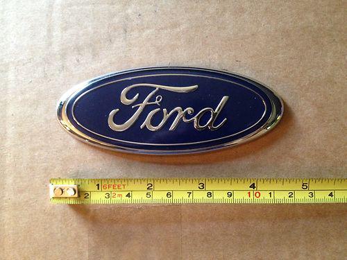 Used in good shape genuine oem rear "ford" emblem for 2001-2007 ford escape