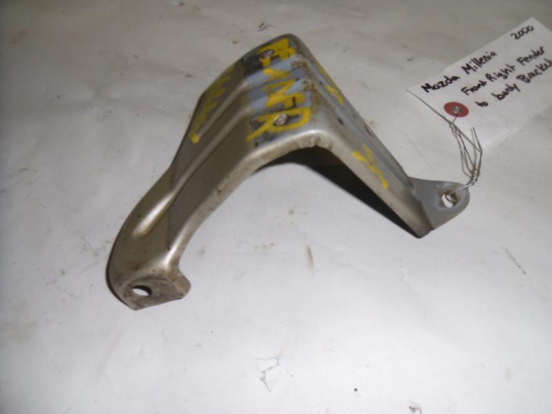 95 96 97 98 99 00 01 02 mazda millenia right fender bracket t0015210xa oem