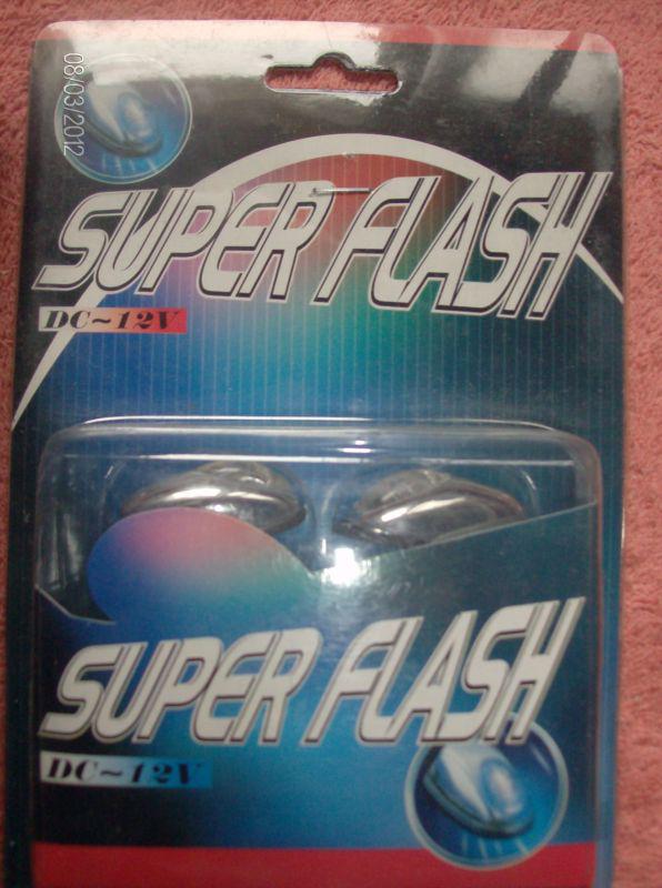 1- pkg super flash windshield washer nozzles 12volt -lighted -red -new in pkg.