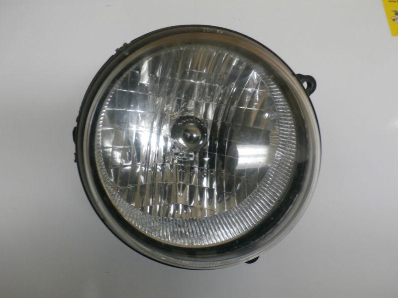 02-04 jeep liberty passenger side head light