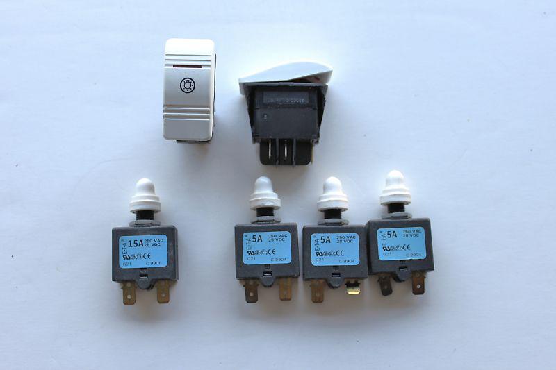 2-carling switches and 3 - 5 amp and 1 - 15 amp breakers