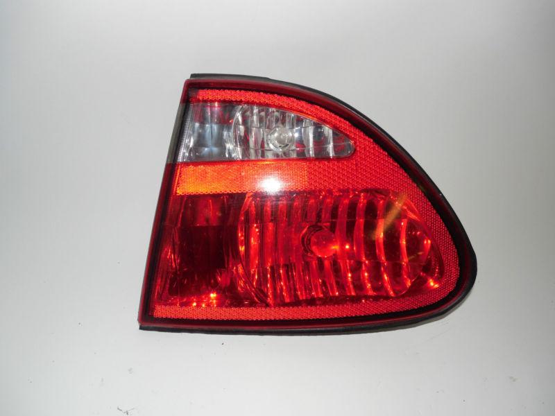 99 00 01 02 03 04 oldsmobile alero lid mounted oem right tail light nice!