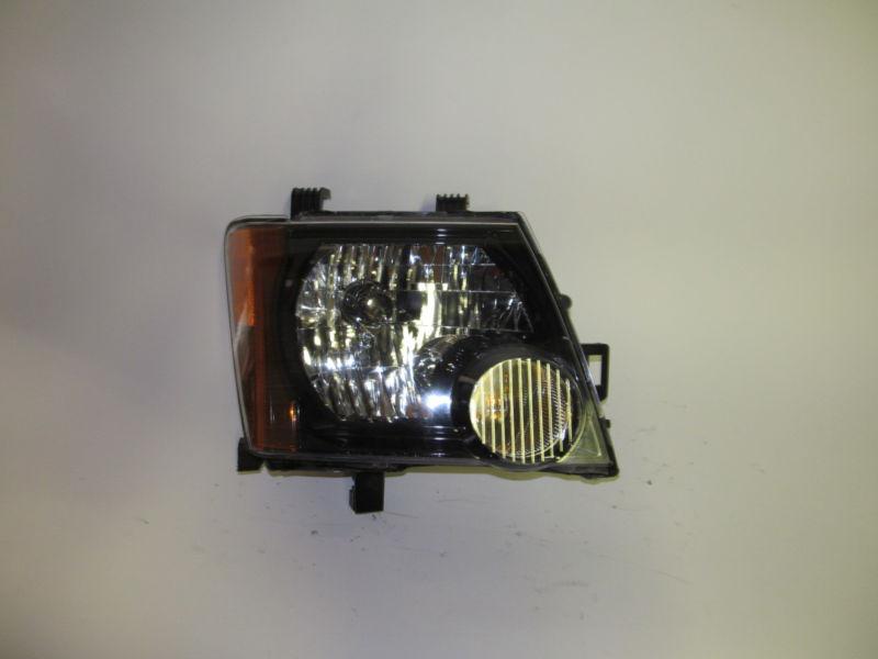 08 09 2010 2011 2012 nissan xterra black bezel oem right headlight nice!