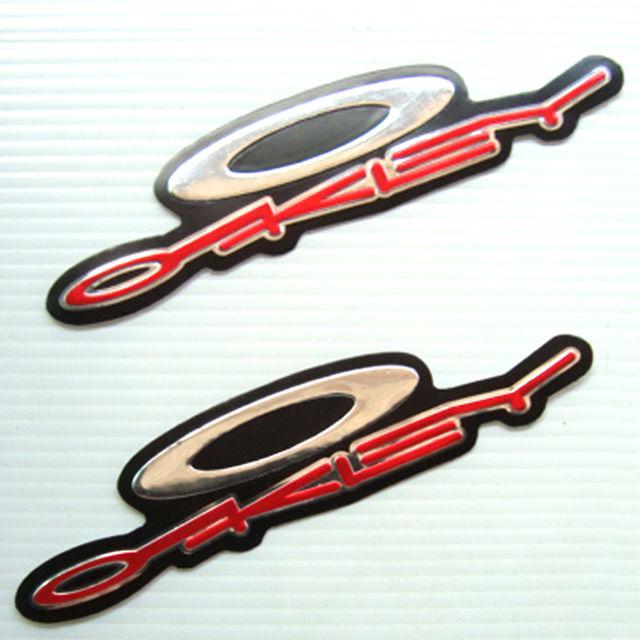 2pc. oakley optics red racing decals sticker die-cut foil emboss helmet car bike