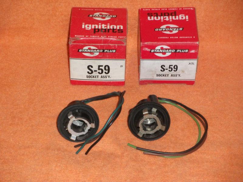 2 nos standard ignition parts s-59 turn sig., back up, tail lamp  socket