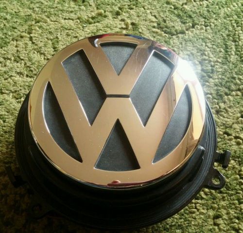 2006-2010 vw used oem passat trunk latch release handle emblem