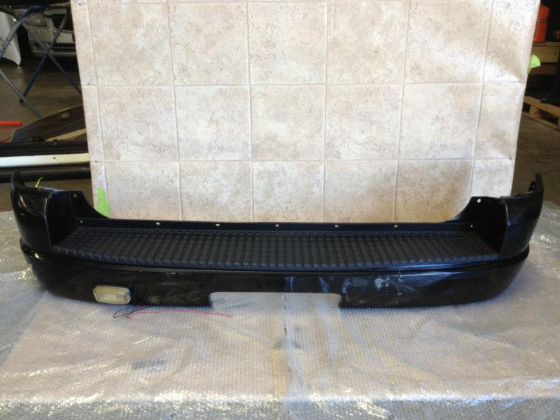 2004 ford explorer rear bumper cover/used/oem