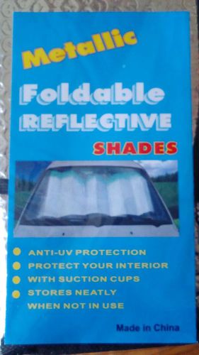 Metallic foldable reflective shades