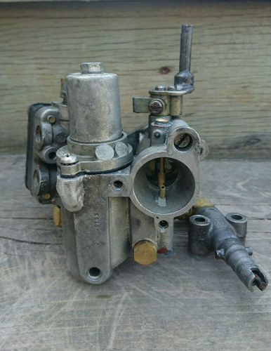 Mercury 4.5 hp outboard kb10a carburetor with fuel pump and fuel inlet.