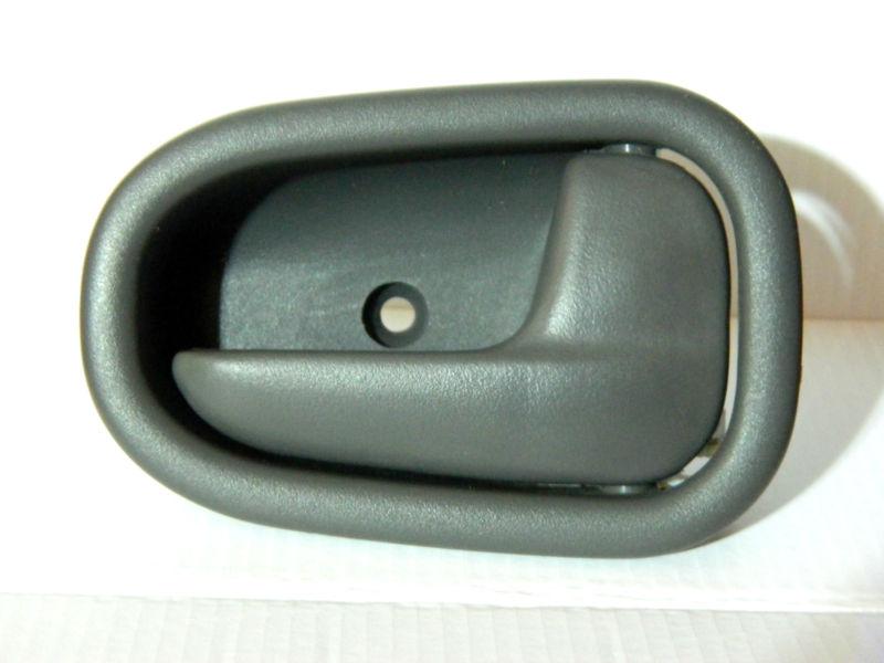  gently used 2000 kia sportage interior right door handle grey taupe 