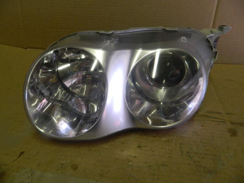 Hyundai tiburon lh  headlight assembly 00 01 drivers side