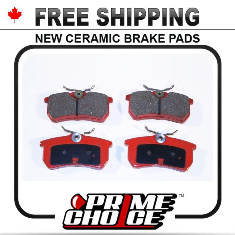 New premium complete set of rear ceramic disc brake pads with shims