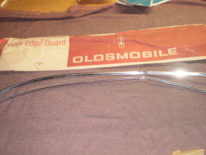 Oldsmobile 67 88, 98 2door door edge guard package orig. gm nos