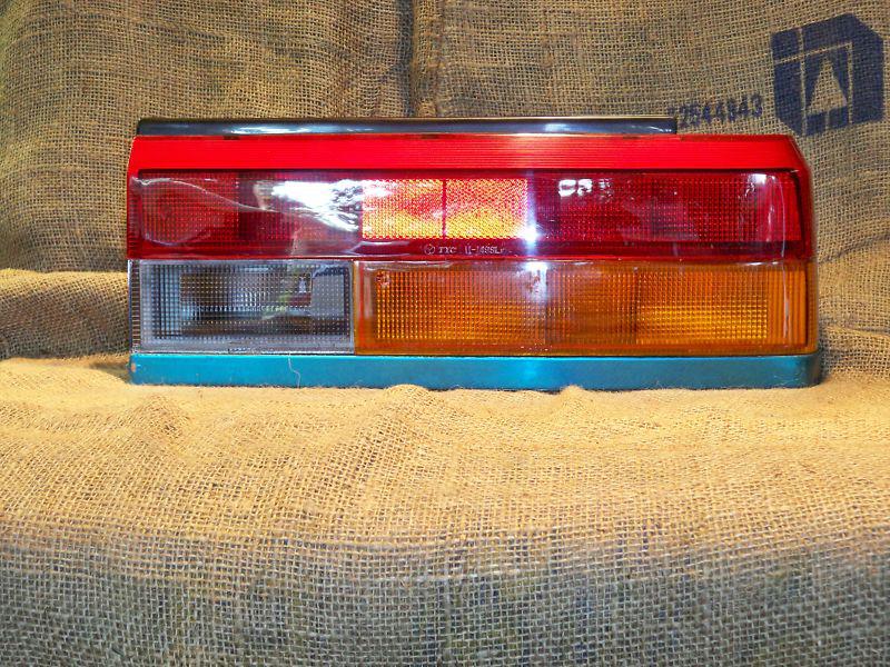 1987-1988 nissan sentra rh passenger tail lamp w/chr mldg