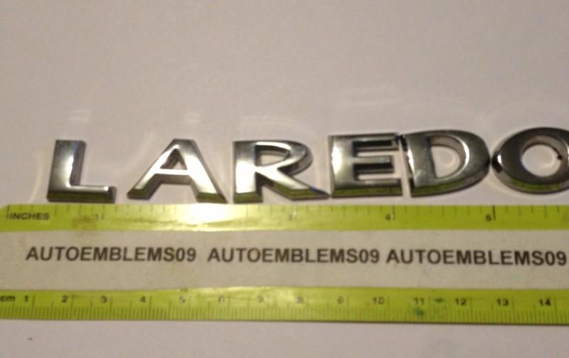 Jeep chrome laredo emblem used