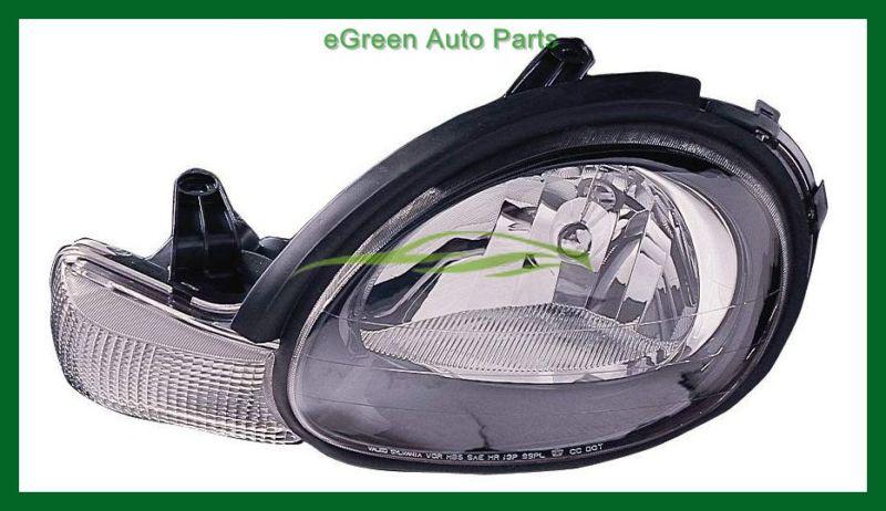 00-02 neon head light lamp left driver black bezel