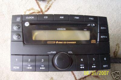 00- 01-mazda-mpv - radio ,6 cd in dash ( new take out )