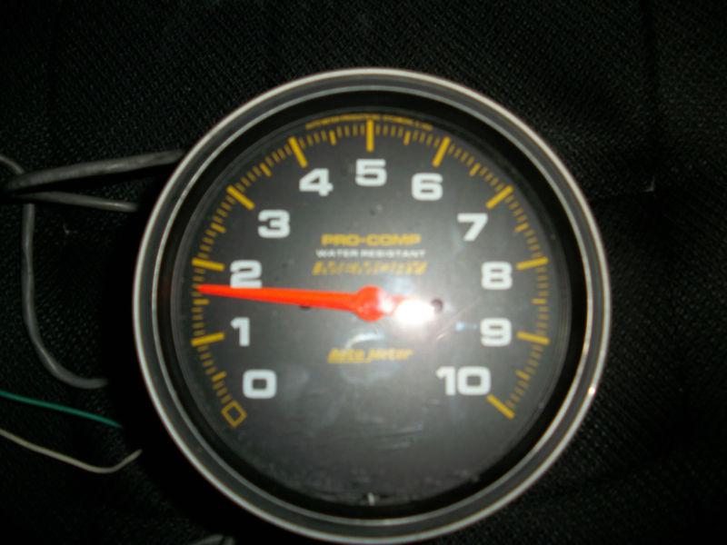 Used auotmeter pro comp dash mount 10,000 rpm auto meter tachometer with memory