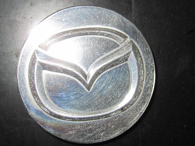 Mazda original equipment wheel center cap oe# 2112