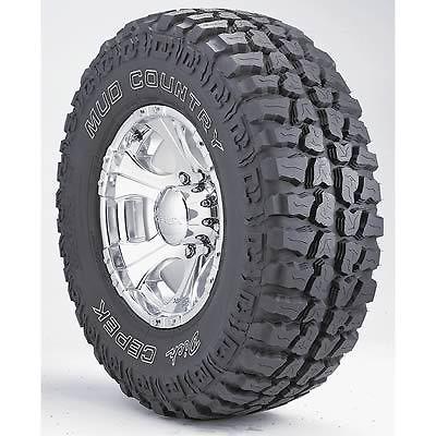 Dick cepek mud country tire 305/60-18 outline white letters 23285 set of 4