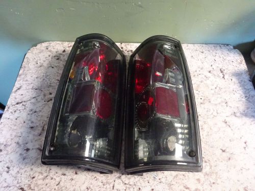 Chevy s10 1991 gmc sonoma pickup tail lights black dark smoke 1 pair used