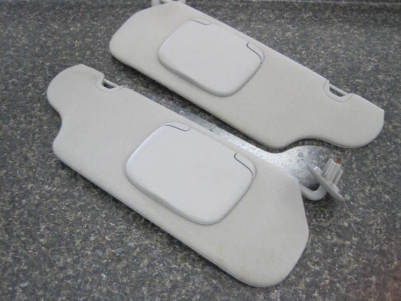 Left right pair grey sunvisors sun visor visors used driver passenger side