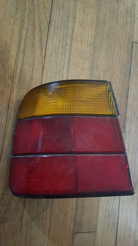 1985-1995 bmw 740i hella tail light housing d/side part # thk 88 sae aist 87 dot