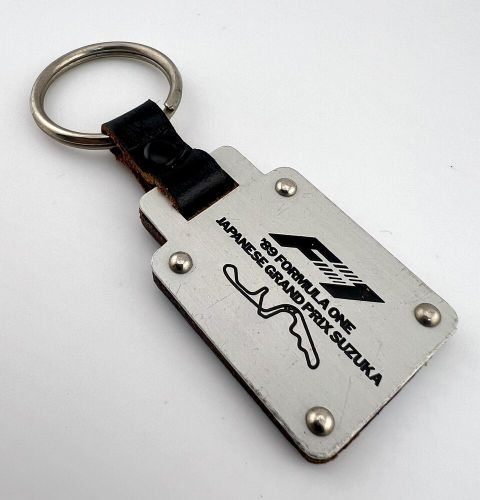 Genuine f1 grand prix 1989 japan suzuka key holder 90’s formula one prost senna