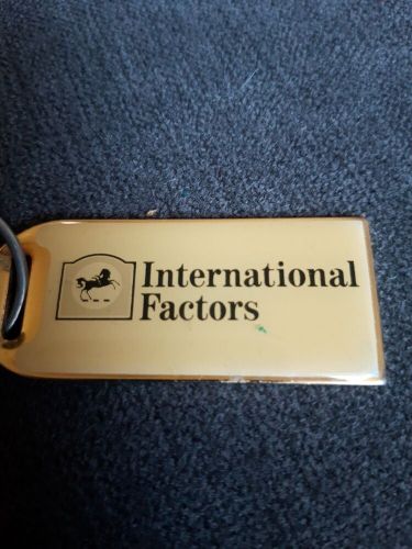 Genuine international factors metal keyring