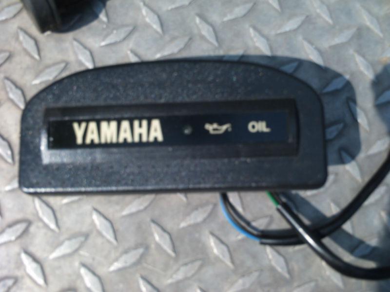 Yamaha 2 cycle oil reservoir float assembly and dash monitor with warning light