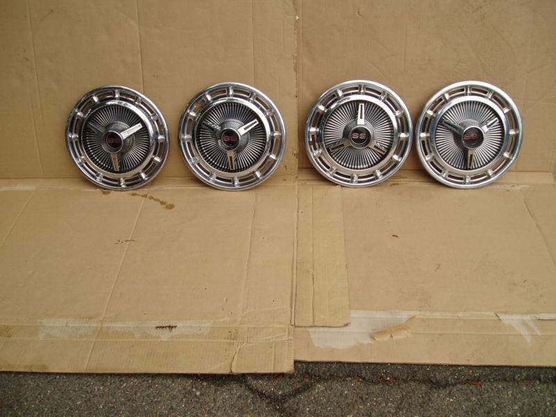 65-66 chevrolet chevy nova, impala, malibu, chevelle- set (4) used 14" hubcaps