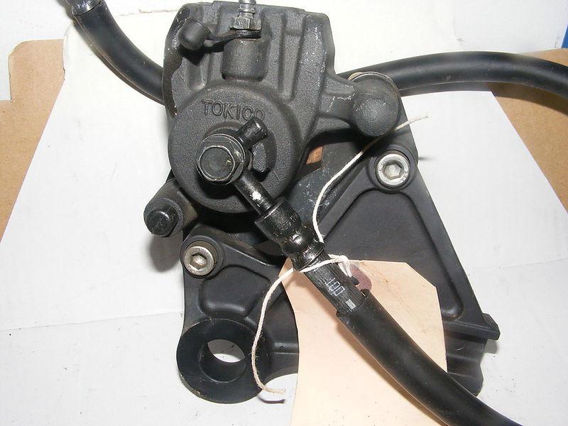 09 kawasaki ex650c rear brake caliper   890 miles