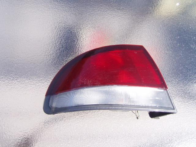 93 94 95 96 97 mazda 626 left driver side taillight  w/ bulbs