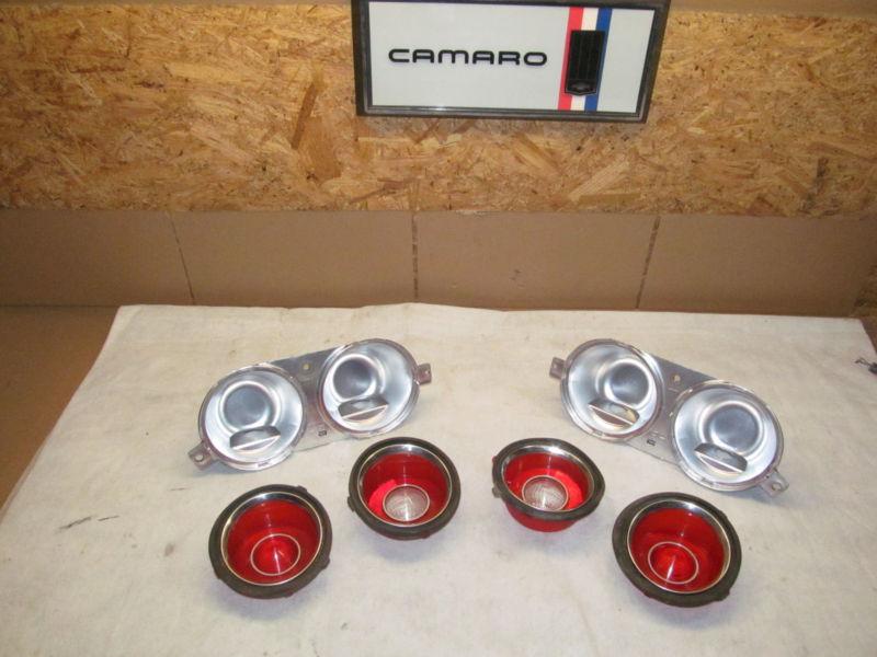 70-73 camaro, z28 ( factory (( gm ))  tail lights ) lh-rh ..with housings