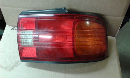 1994 mazda protege passenger tail light 166-58823r