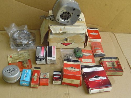 Lot of mostly briggs small engine parts inc nib rings mufflers points carb sprin