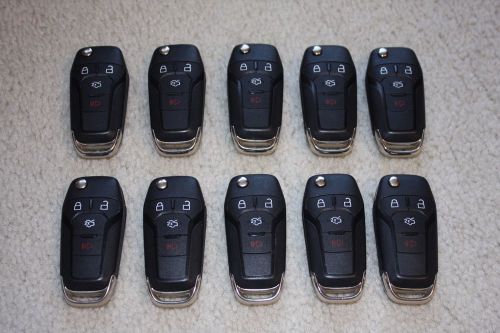 Lot of 10 ford 4 button flip key fobs oem: fcc id n5f-a08taa  used-good cond