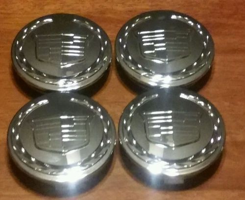 Cadillac escalade cts set of 4 center caps 2007-12 part 88963142 gm oem new