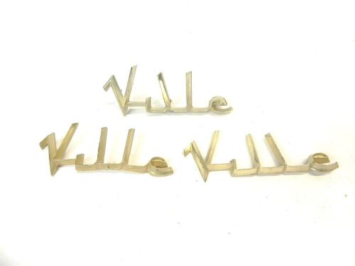 Vintage antique used 1955-1959 cadillac couple deville seville script emblem lot