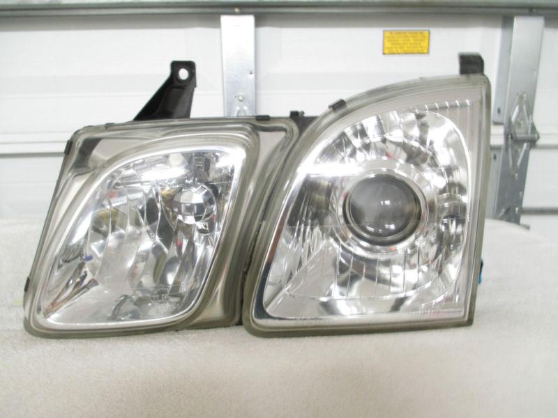 1997,1998,1999,2000 lexus lx470 left headlight(oem)