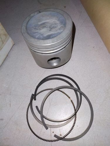 New vw 75-84 piston set # 049 198 065 afs