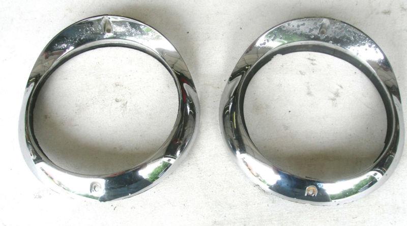 55 chevy headlight bezels [pair]  item#1